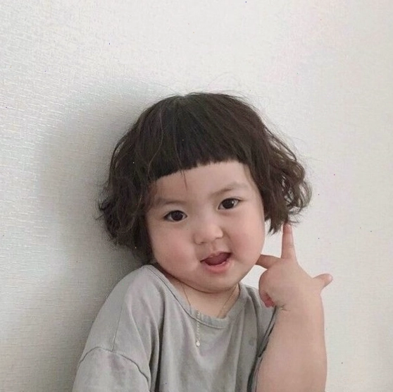 Meme em bé cười tươi vui thể hiện sự hạnh phúc tột độ